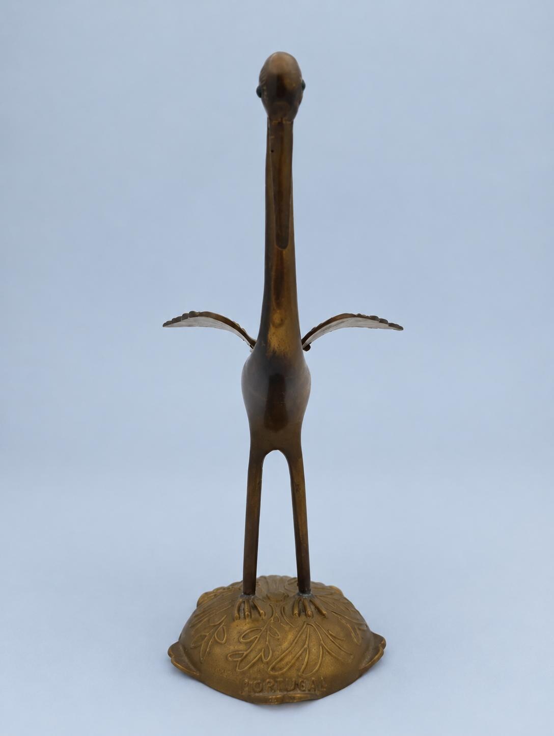 Vintage Brass Crane Figurine with Spread Wings and Green Eyes, Marked Portugal, Engraved Feather Detail on Leaf-Cast Base, 24 cm
