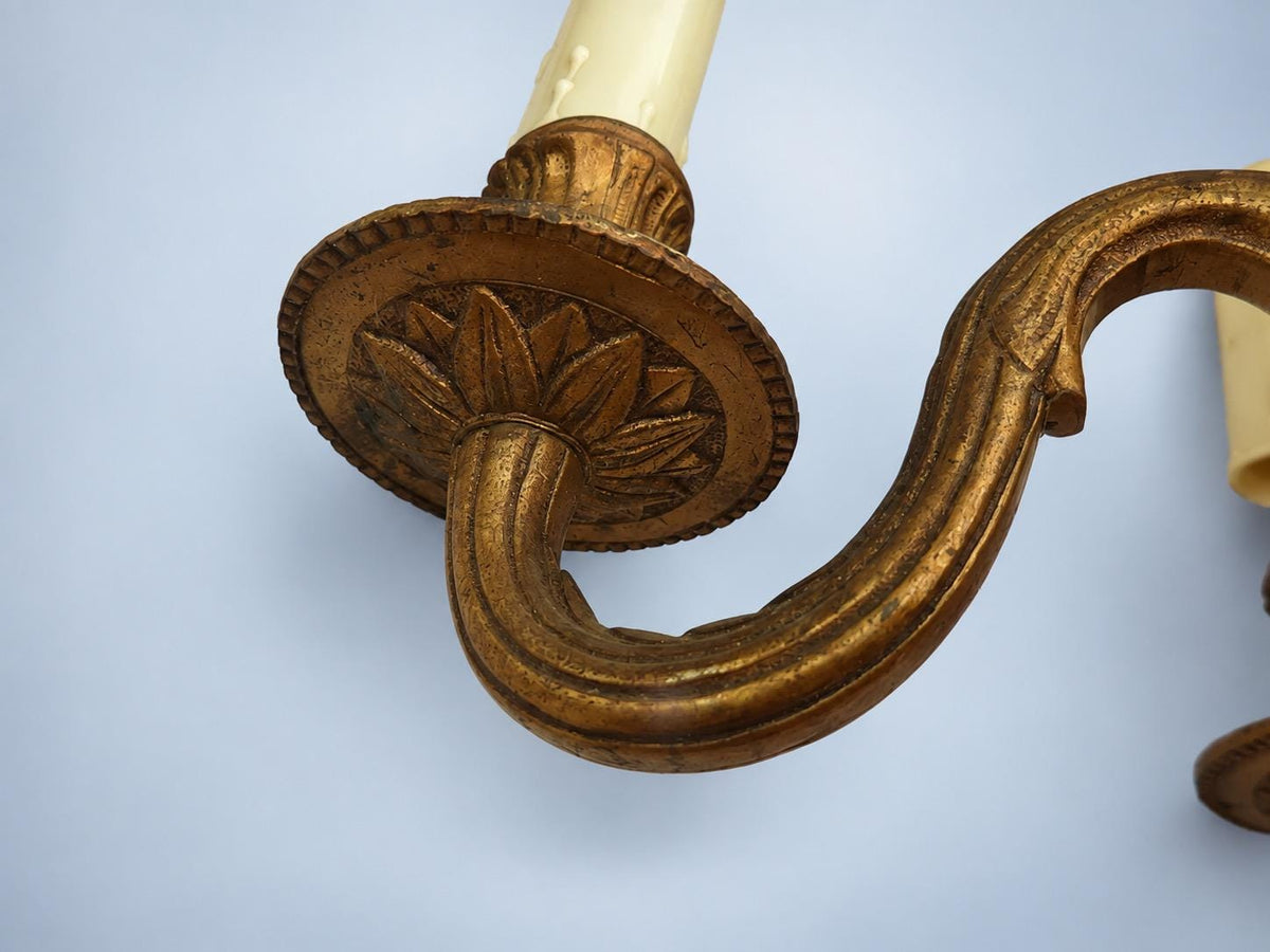 Vintage Pair of Louis XVI Style Gilt Metal Two-Arm Wall Sconces with Urn and Garland Crest