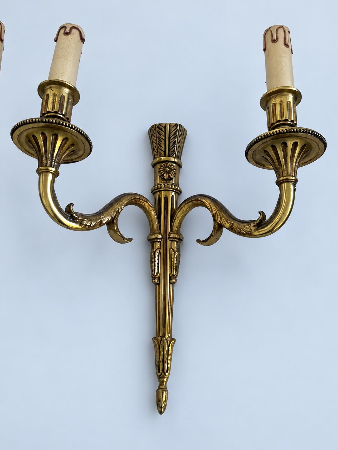 Vintage Pair of Louis XVI Style Gilt Metal Two-Arm Wall Sconces with Fluted Shaft and Rosettes