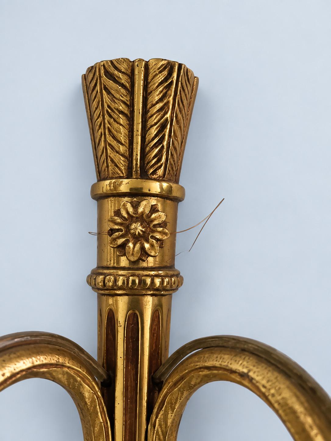 Vintage Pair of Louis XVI Style Gilt Metal Two-Arm Wall Sconces with Fluted Shaft and Rosettes