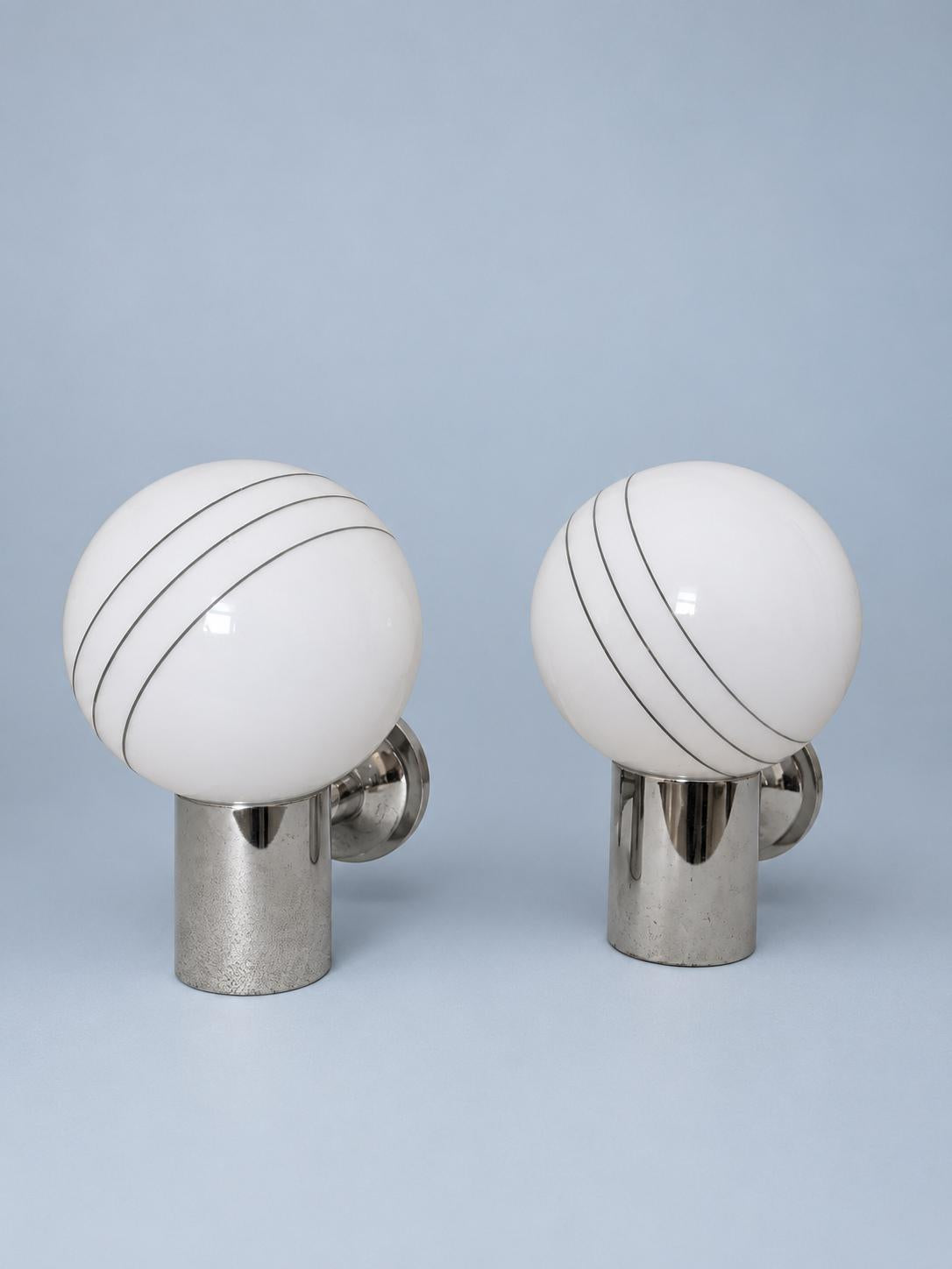 Pair of Vintage White Glass Globe Wall Sconces, Three Curved Grey Stripes, Chrome-Tone Cylinders and Round Backplates
