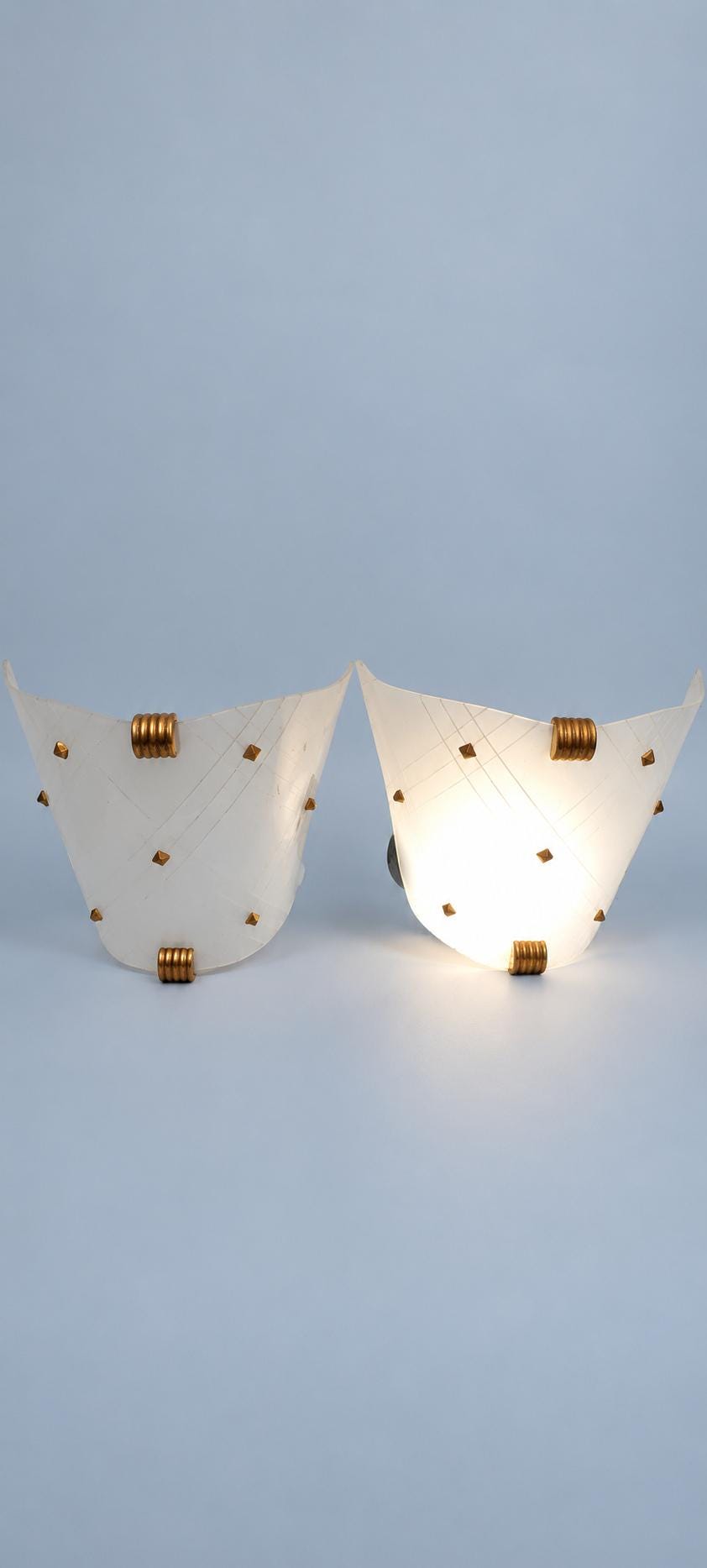 Vintage Pair of 1950s–60s French Wall Sconces with Folded White Acrylic Shades and Copper-Tone Clips