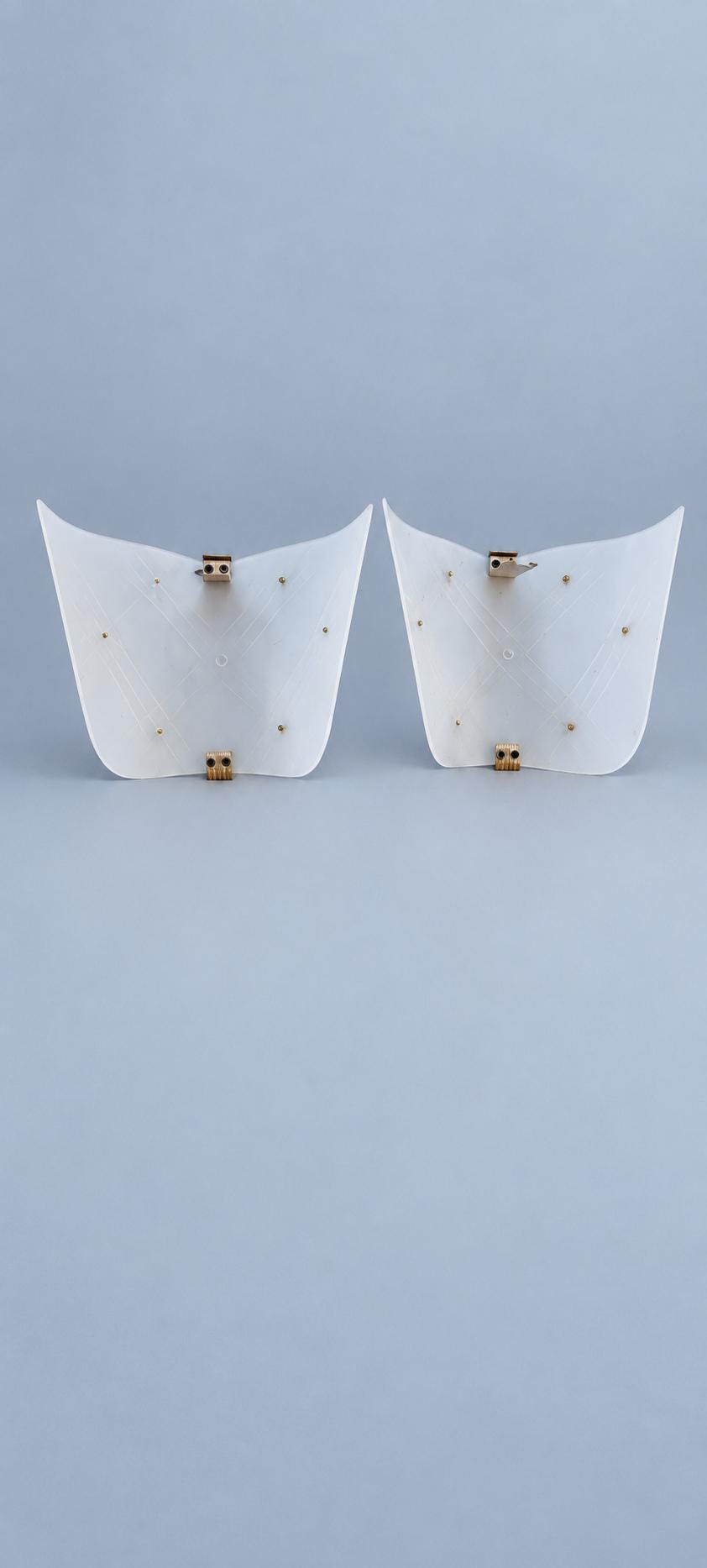 Vintage Pair of 1950s–60s French Wall Sconces with Folded White Acrylic Shades and Copper-Tone Clips