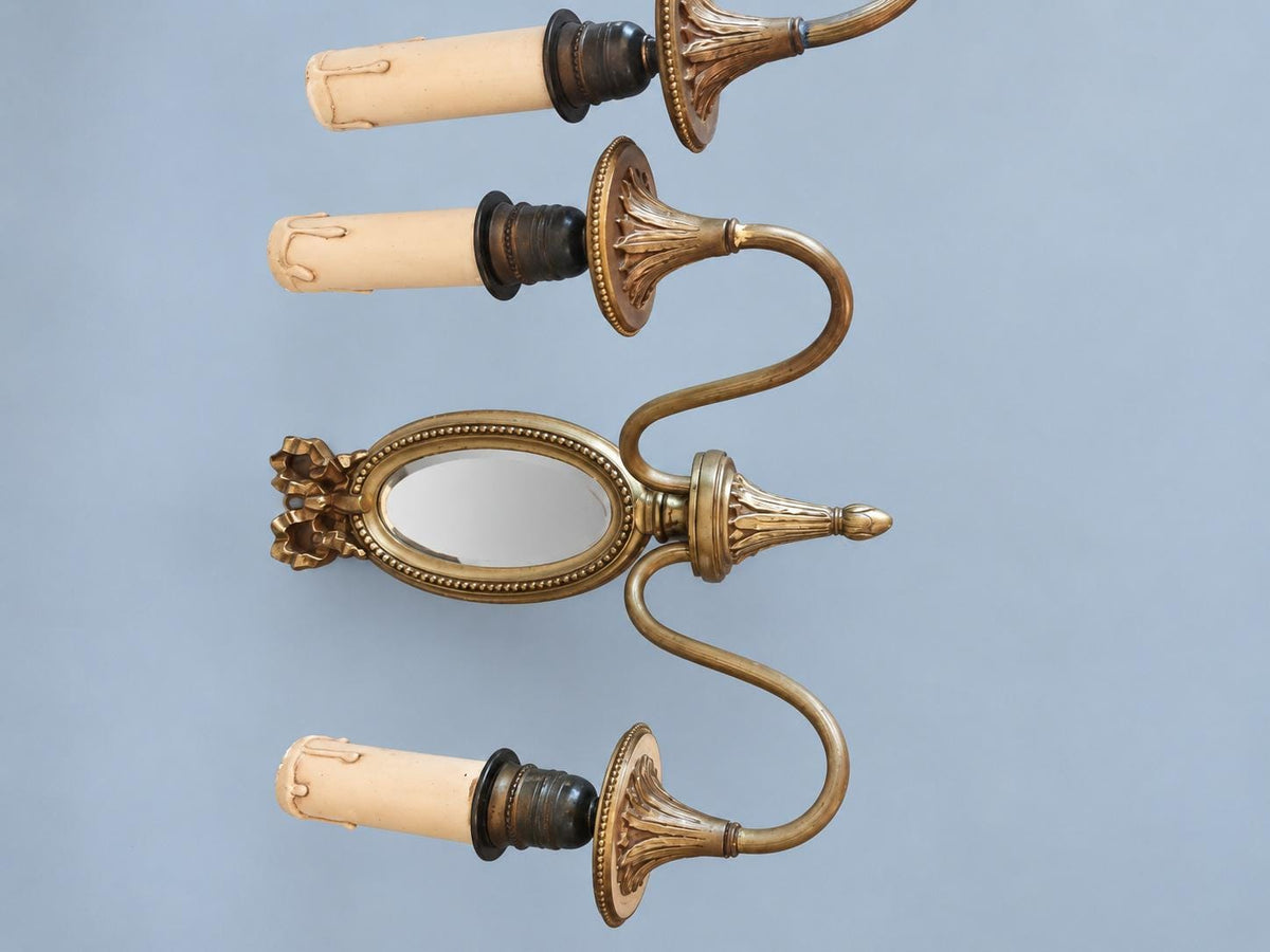 Vintage Pair of Louis XVI Style Two-Arm Wall Sconces with Oval Bevelled Mirrors and Ribbon Bows