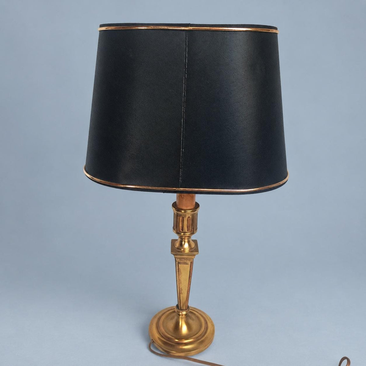 Vintage 1980s Louis XVI Style Brass-Tone Candlestick Table Lamp with Black and Gold Oval Shade