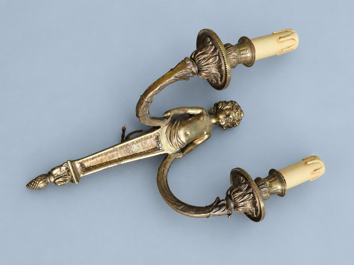 Antique Single Louis XVI Style Bronze-Tone Two-Arm Wall Sconce with Cherub Term Figure