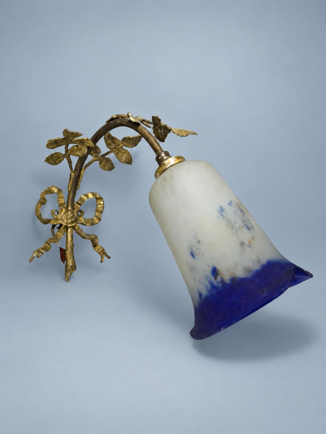 Vintage Single Louis XVI Style Gilt Metal Wall Sconce with Ribbon Bow, Leafy Branches and Mottled Cobalt Glass Tulip Shade