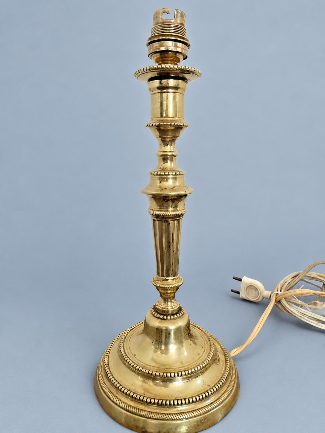 Antique Louis XVI Style Brass-Tone Candlestick Table Lamp with Beaded Friezes and Fluted Stem