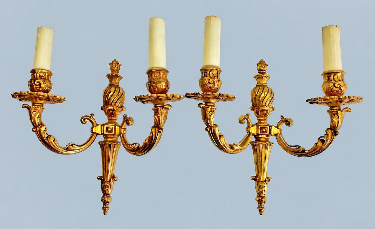 Vintage Pair of Louis XVI Style Two-Arm Gilt Metal Wall Sconces with Flame-Topped Urn and Acanthus Scroll Arms