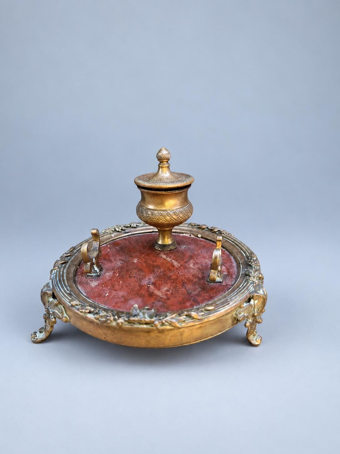 Antique Louis XVI Style Inkwell, Red Marble Circular Tray with Gilt-Tone Metal Urn and Two Pen Rests