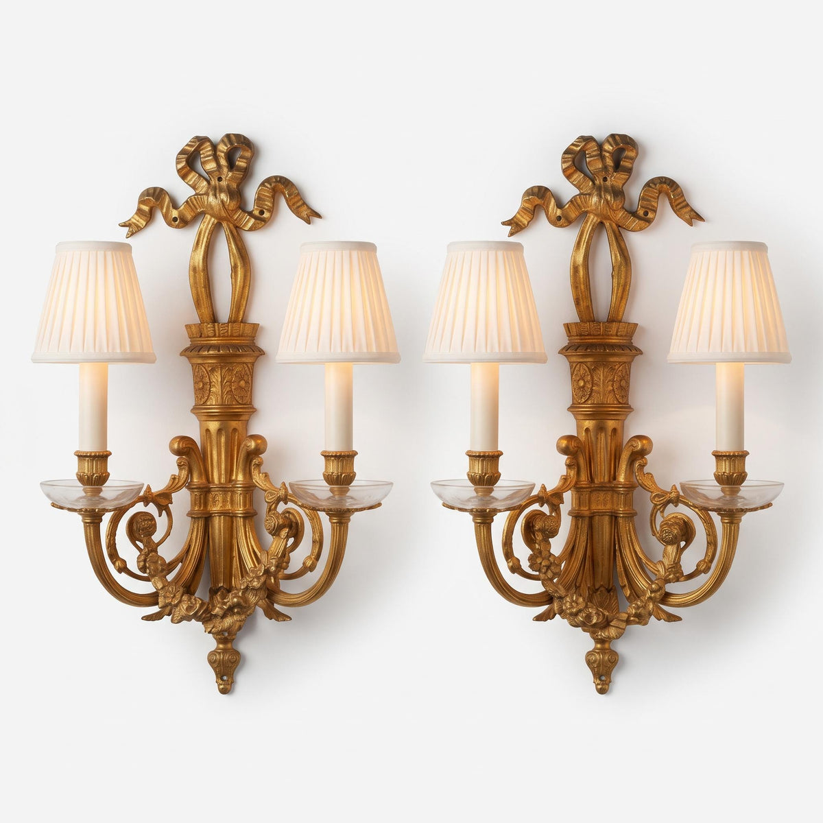 Vintage Pair of Louis XVI Style Brass-Tone Two-Arm Wall Sconces with Ribbon Bow, Flower Garlands and Glass Drip Pans