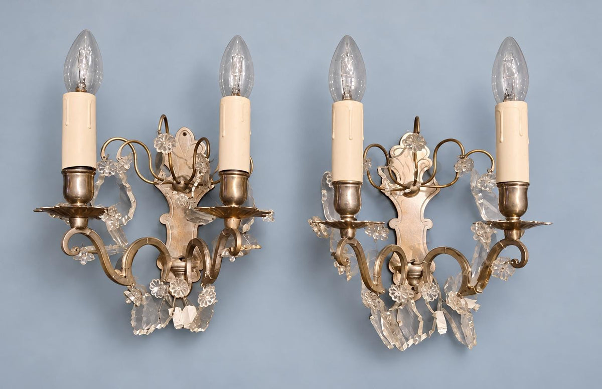 Pair of Vintage Louis XV Style Nickel-Plated Brass Wall Sconces with Crystal Drops, Two-Arm Silver-Tone Lights, Circa 1920s–1940s