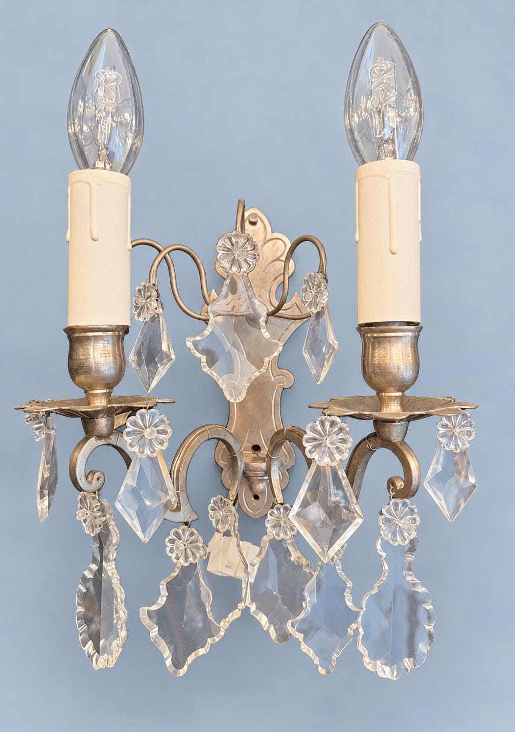 Pair of Vintage Louis XV Style Nickel-Plated Brass Wall Sconces with Crystal Drops, Two-Arm Silver-Tone Lights, Circa 1920s–1940s