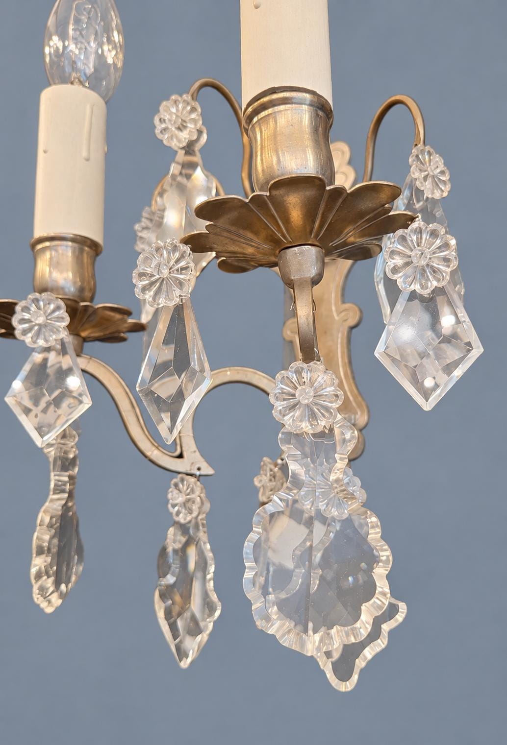 Pair of Vintage Louis XV Style Nickel-Plated Brass Wall Sconces with Crystal Drops, Two-Arm Silver-Tone Lights, Circa 1920s–1940s