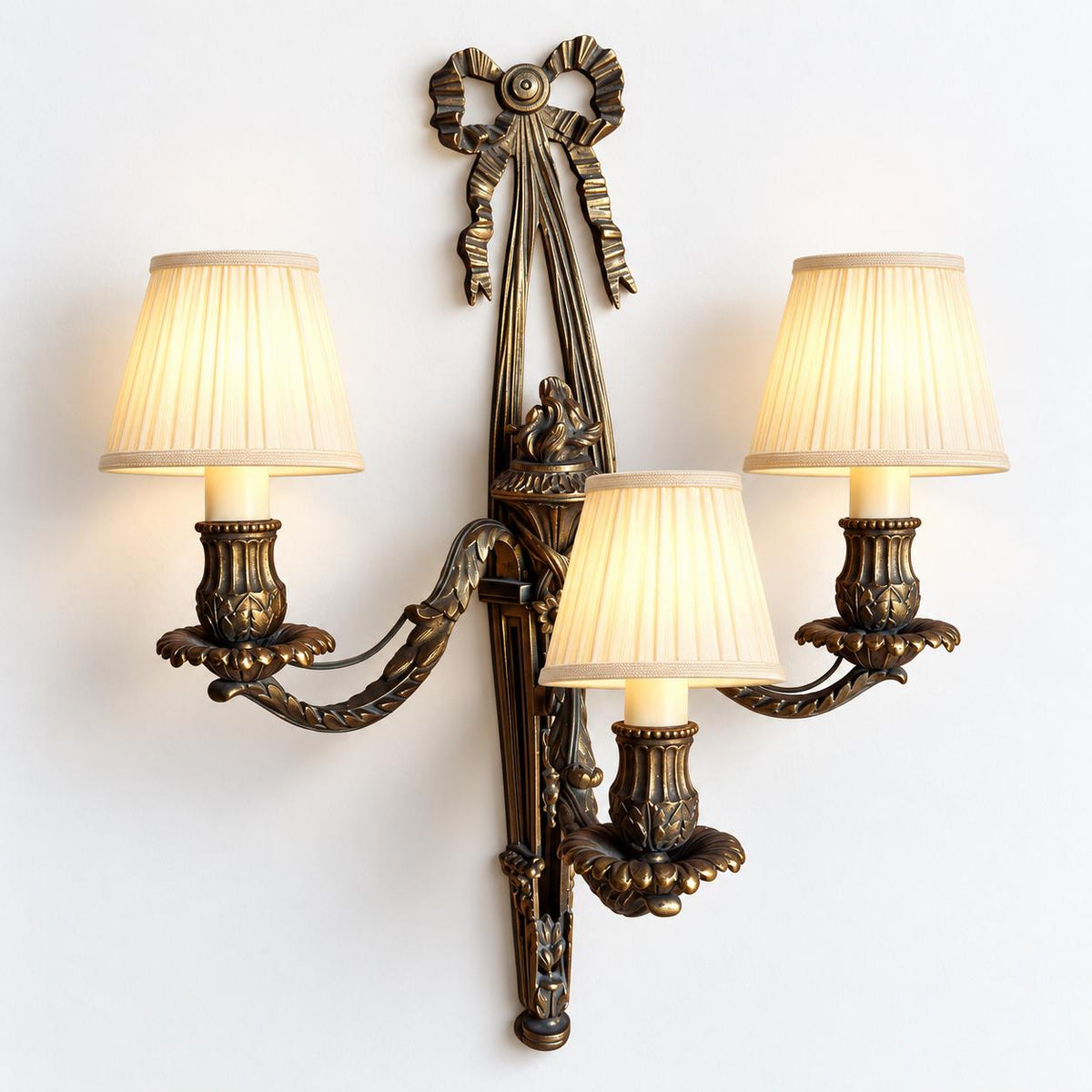Vintage Louis XVI Style Three-Light Bronze-Tone Torch Wall Sconce with Ribbon Bow Crest