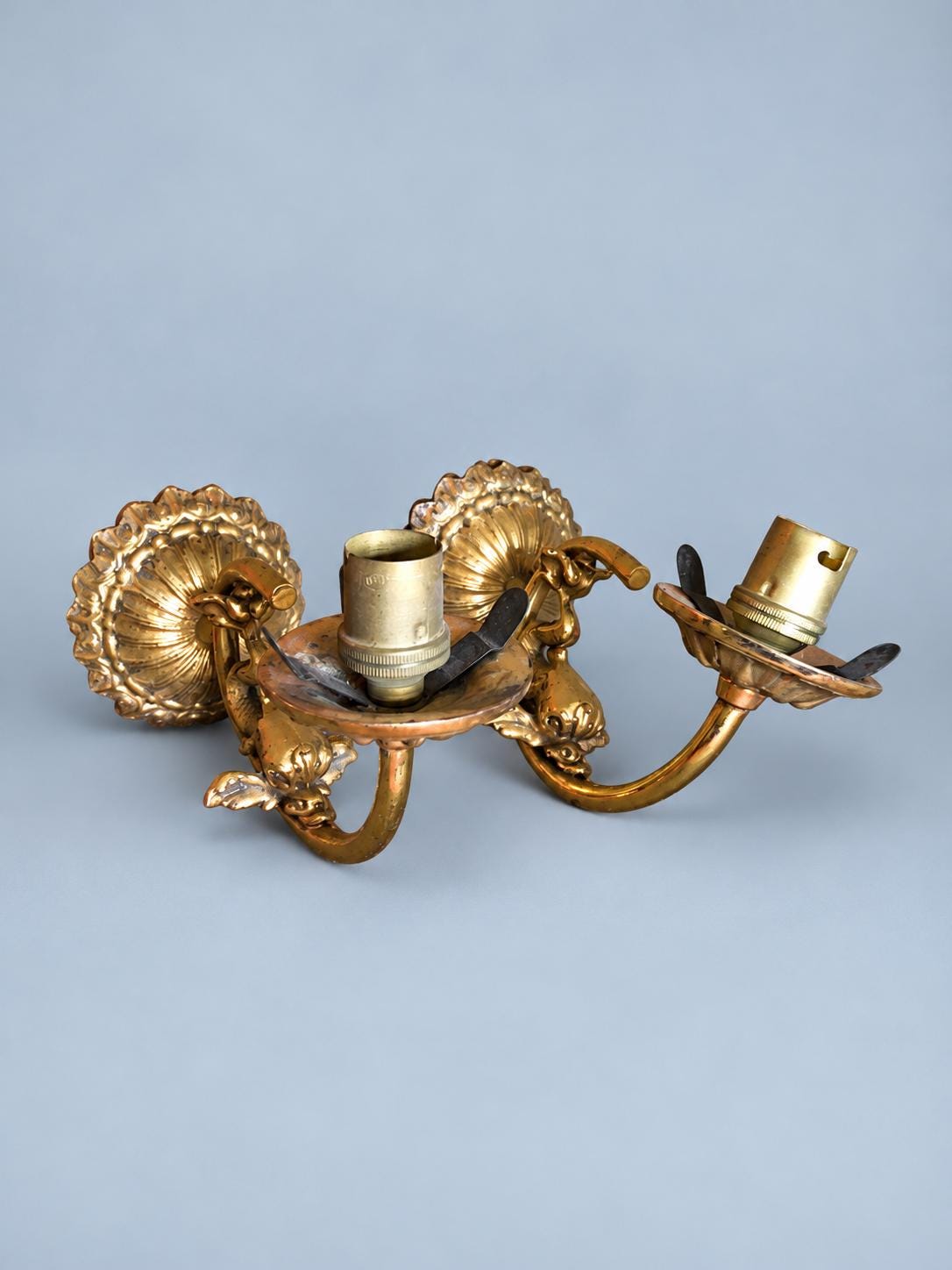 Vintage Pair of Gilt Metal Wall Sconces, Attributed 20th Century, Fluted Rosette Backplates and Leafy Arms, Shade-Holder Prongs