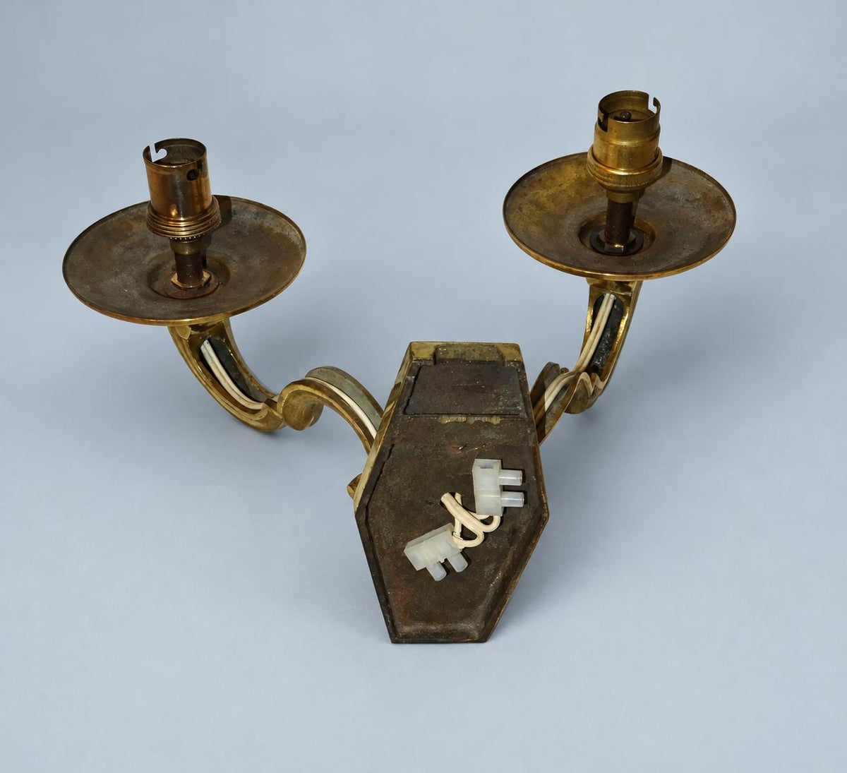 Vintage Pair of Louis XIV Style Polished Brass Wall Sconces, Faceted Backplates with Heavy Scroll Arms, Two Lights Each