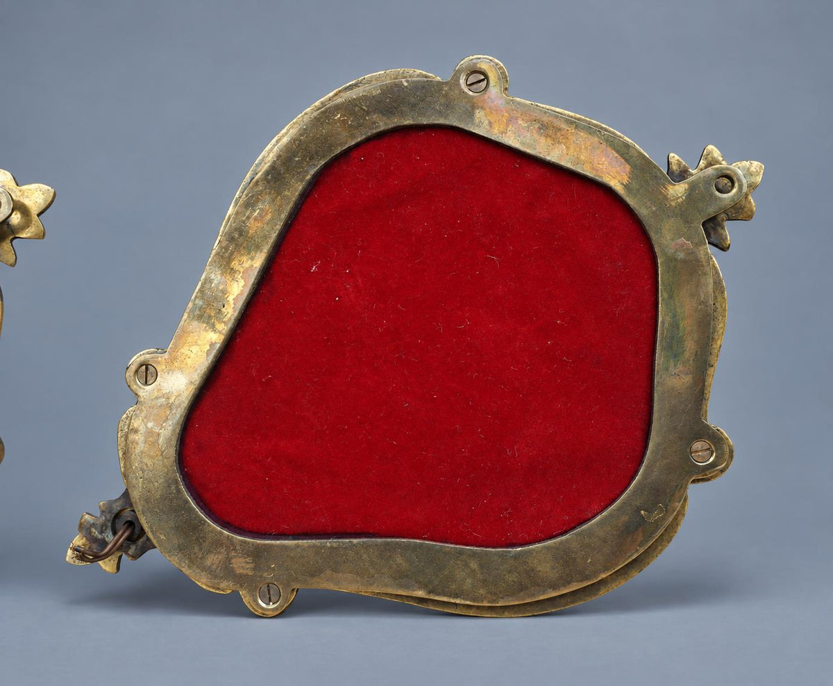 Vintage Pair of Single-Light Mirror Wall Sconces, Cartouche-Shaped Mirrors in Two-Tone Metal Frames with Palmette Crests, 29 cm