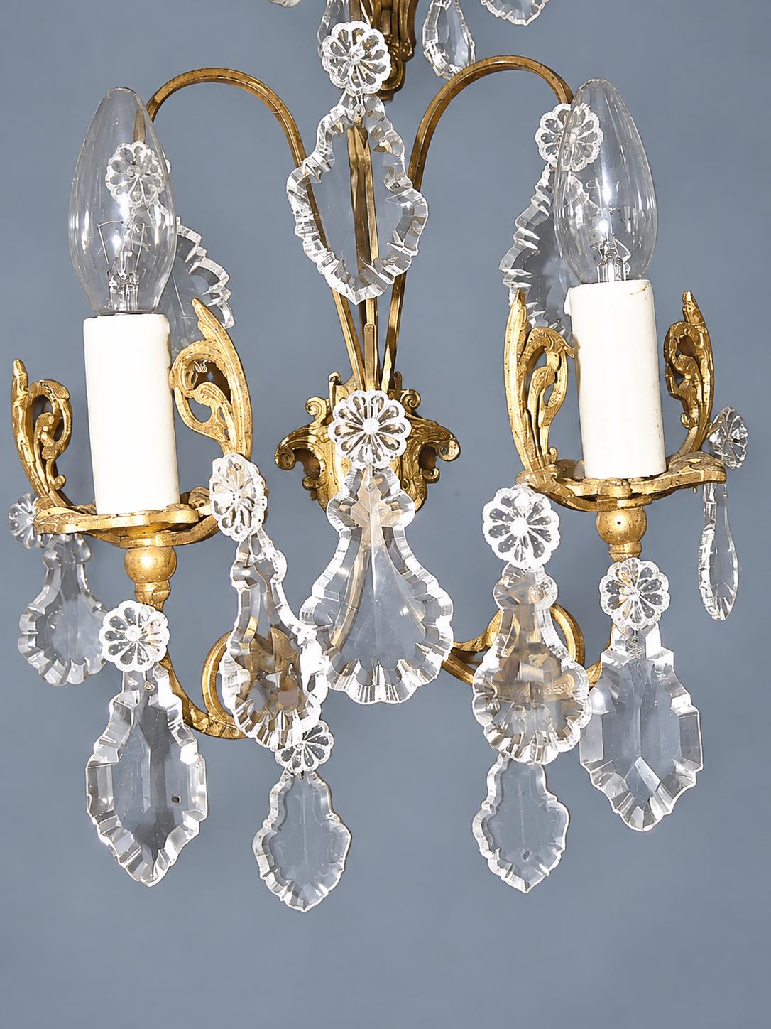 Vintage Pair of Gilt Metal Wall Sconces with Faceted Glass Drops, Two Lights Each, Scrolled Arms and Arched Hoops, Early 20th Century, 33 cm