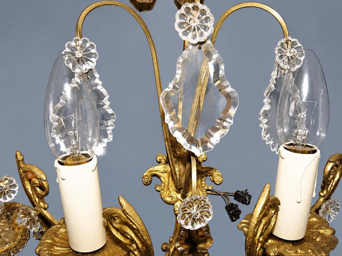 Vintage Pair of Gilt Metal Wall Sconces with Faceted Glass Drops, Two Lights Each, Scrolled Arms and Arched Hoops, Early 20th Century, 33 cm
