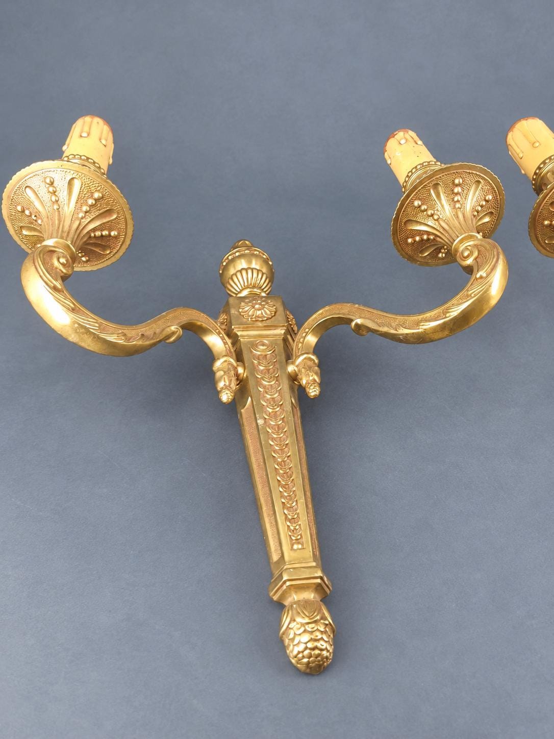 Vintage Pair of Large Louis XVI Style Gilt Metal Wall Sconces, Tapering Backplates with Urn Finials and Rosettes, Two Lights Each, 36 cm