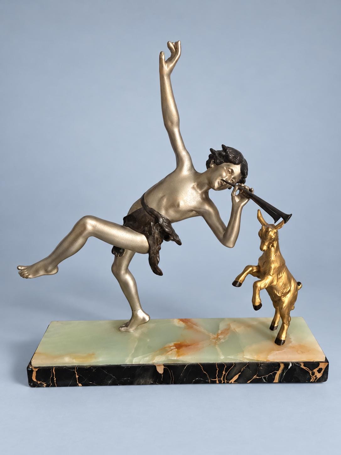 Vintage Art Deco Spelter Sculpture of Pan Playing Pipes with Leaping Goat, Silver and Gold Finish on Onyx and Black Marble Base