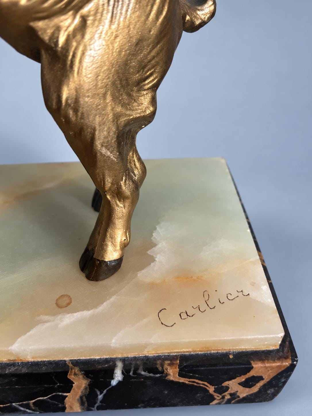 Vintage Art Deco Spelter Sculpture of Pan Playing Pipes with Leaping Goat, Silver and Gold Finish on Onyx and Black Marble Base