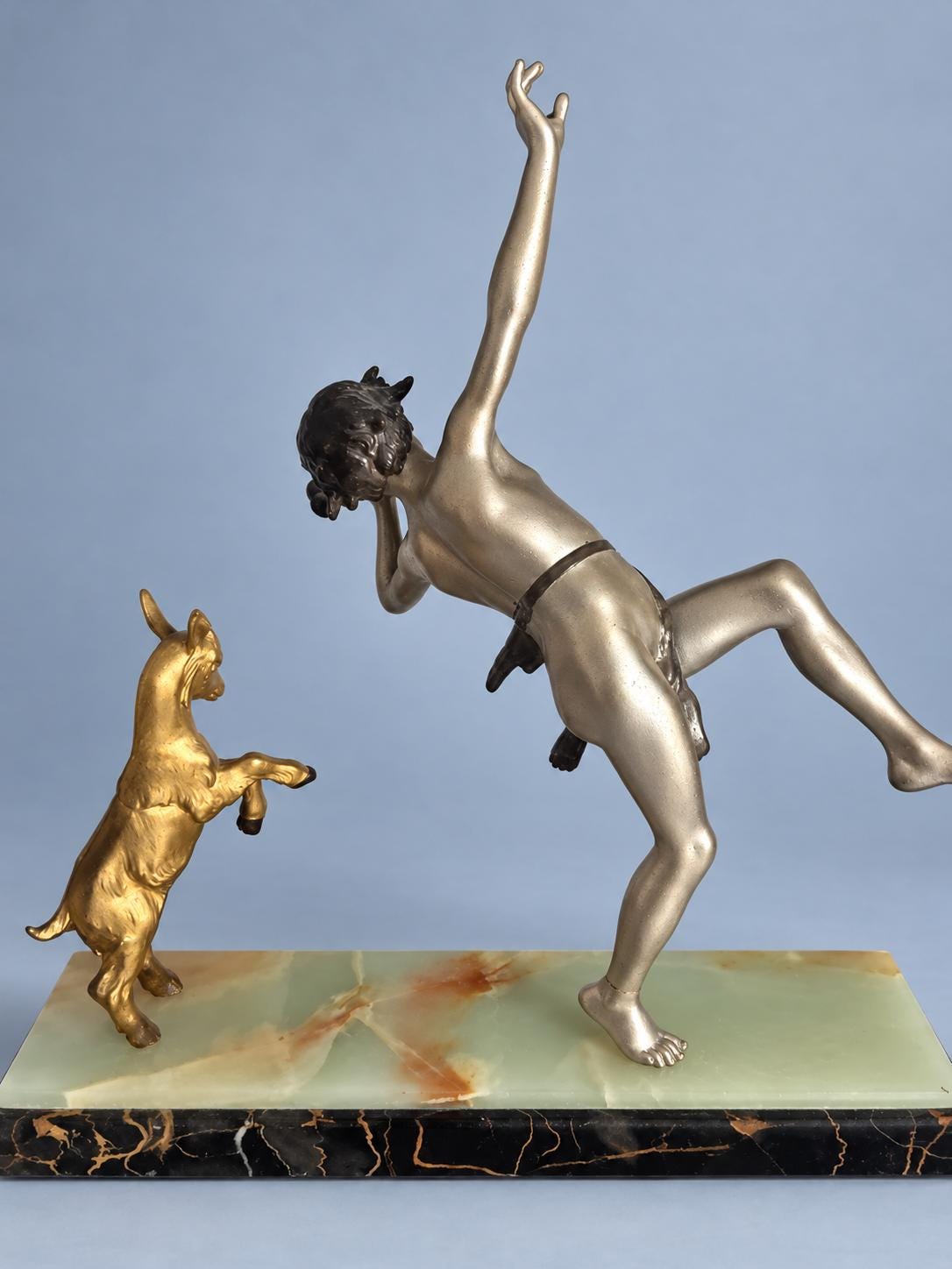Vintage Art Deco Spelter Sculpture of Pan Playing Pipes with Leaping Goat, Silver and Gold Finish on Onyx and Black Marble Base