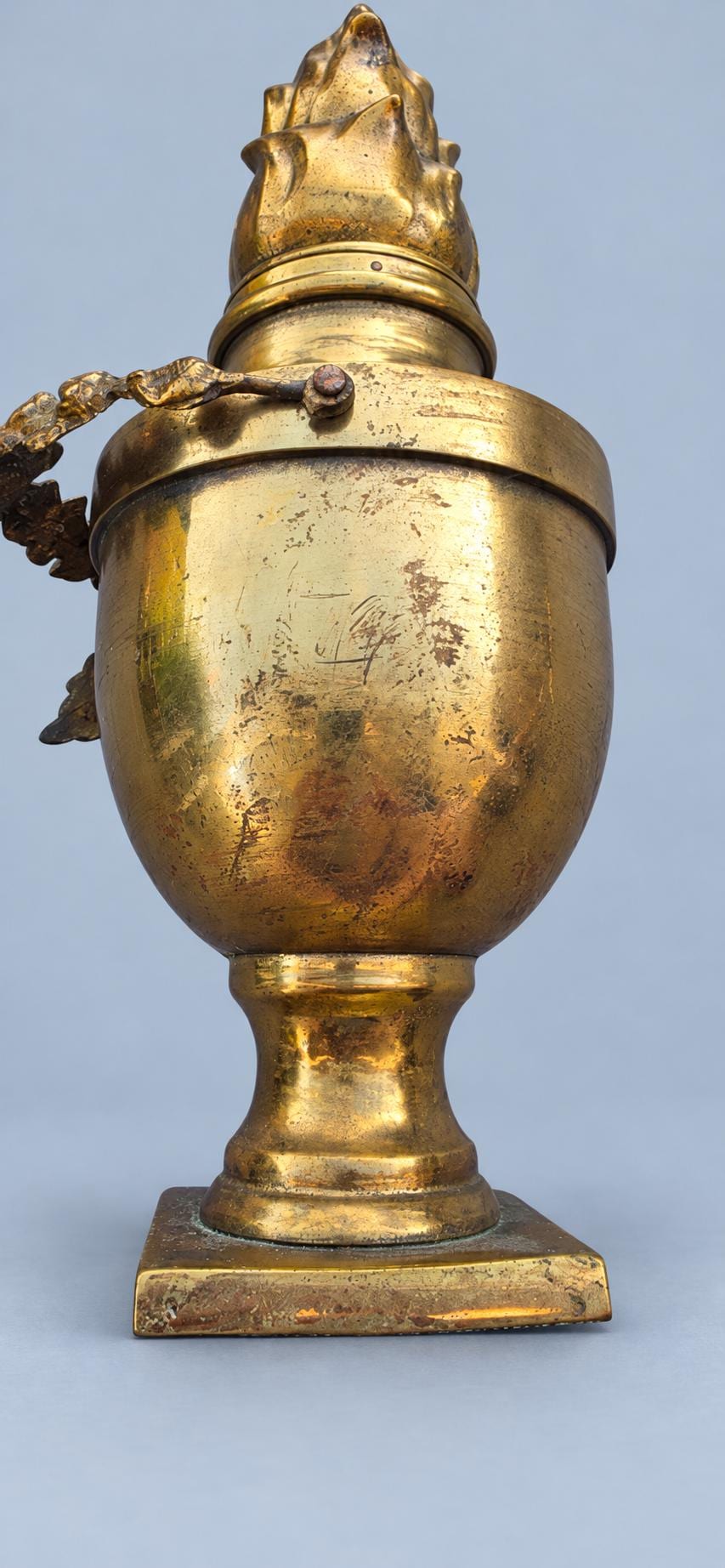 Antique French Louis XVI Style Brass Cassolette Urn with Flame Finial and Rose Garland, Neoclassical Mantel Ornament, Circa 1880–1920