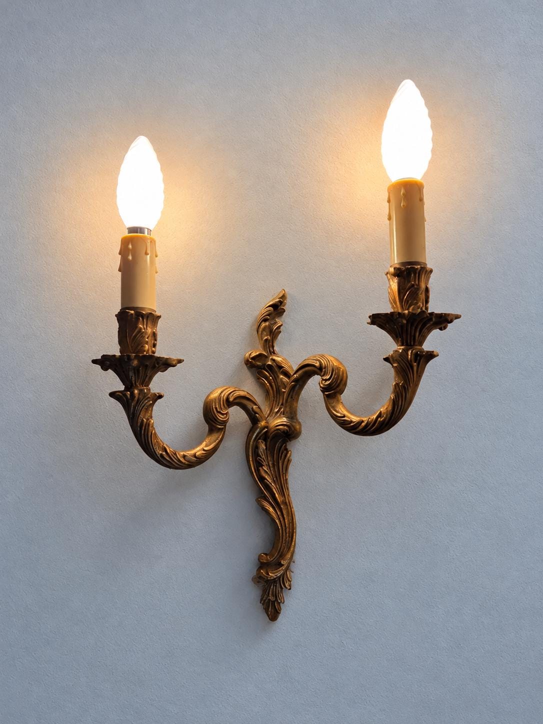 Louis XV Style Gilt Two-Arm Wall Sconce, Interlaced Scroll Arms, 1950s Vintage