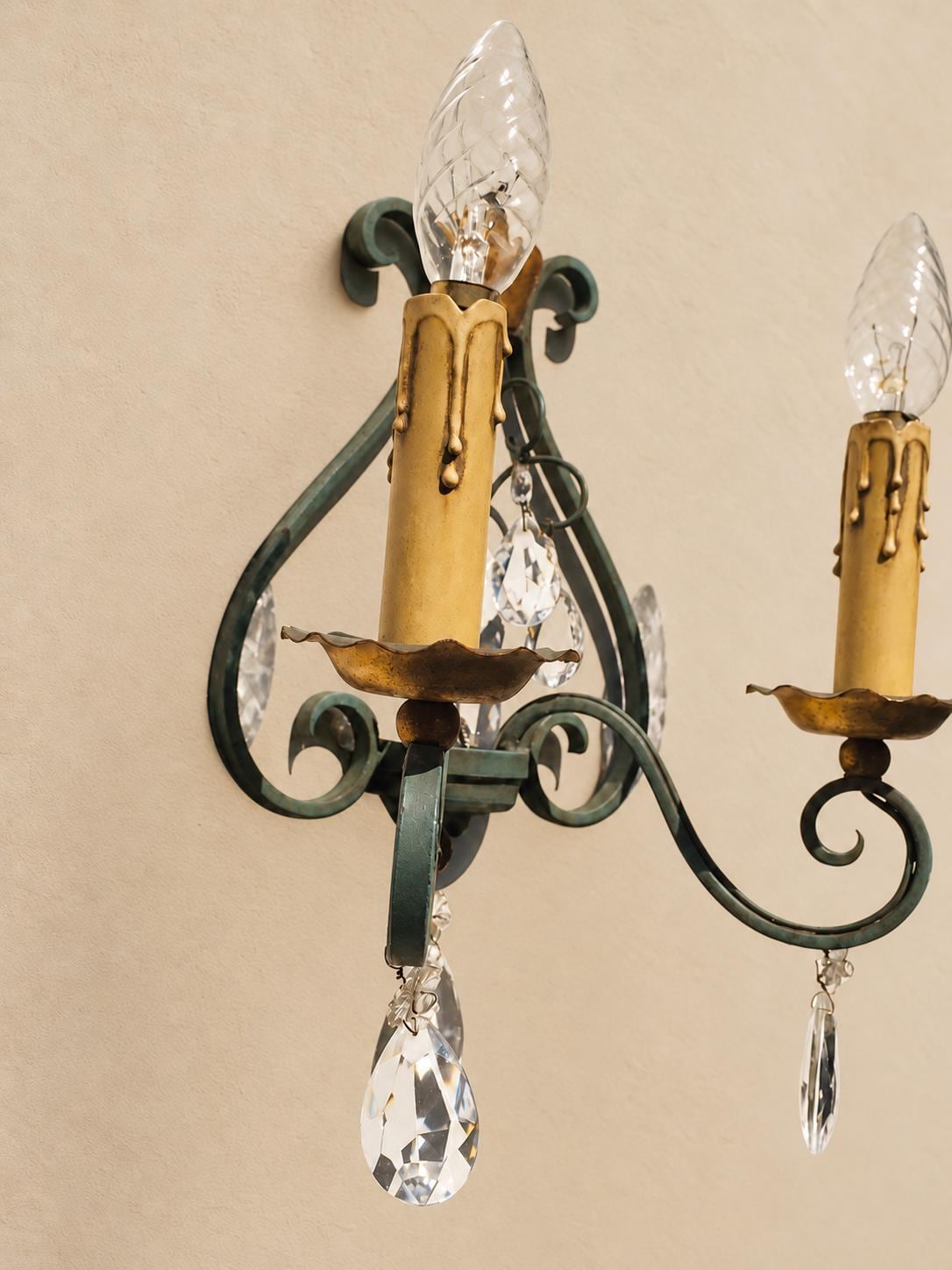 Pair of Vintage 1950s Verdigris Wrought Iron Wall Sconces, Gilt Fleur-de-Lis Crest, Glass Drops, Hollywood Regency Lights