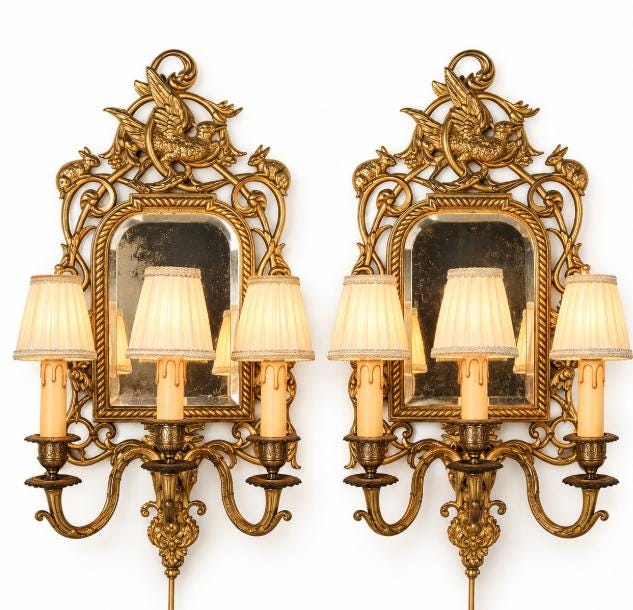 Pair of Antique Bronze Mirrored Wall Sconces, Three-Light Girandoles with Rabbits, Winged Bird Crest and Beveled Glass, 1890s