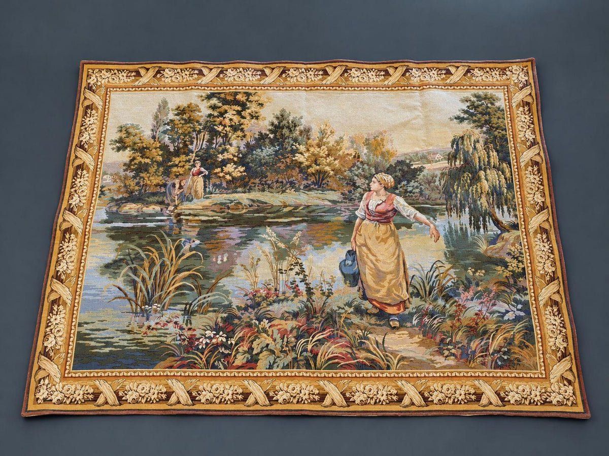 Vintage Flemish Woven Jacquard Wall Tapestry, Washerwoman by a River Landscape with Rose Ribbon Border, 61 x 45 Inches