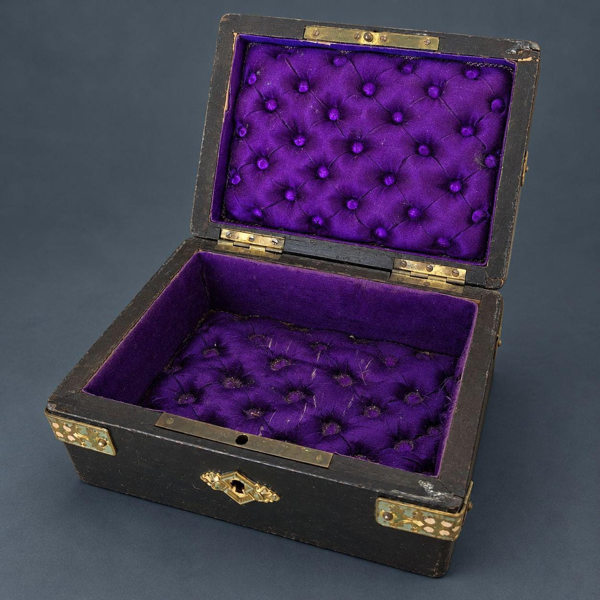 Antique Napoleon III Egyptian Revival Ebonized Box with Enameled Brass Pharaoh Head and Strapwork Mounts, Purple Silk Lining
