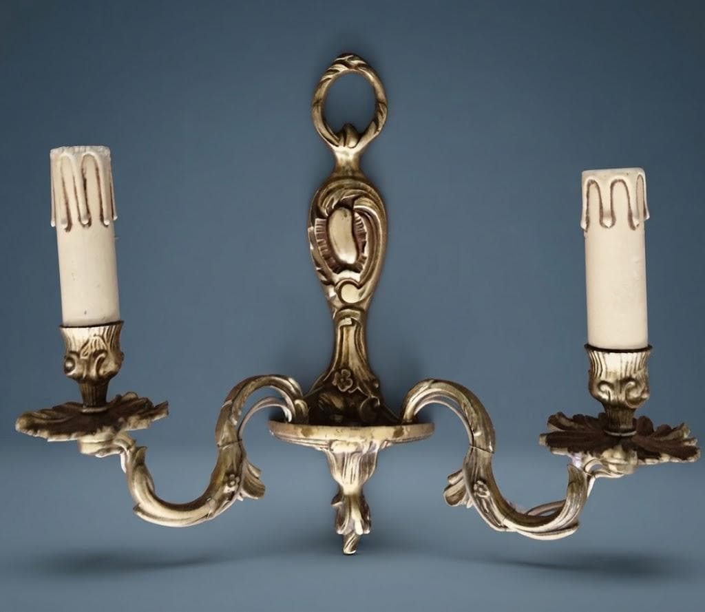 Pair of Vintage 1970s Bronze Louis XV Style Wall Sconces, Two-Arm Design with Laurel Ring Crest and Cartouche Backplate, Candle Lights