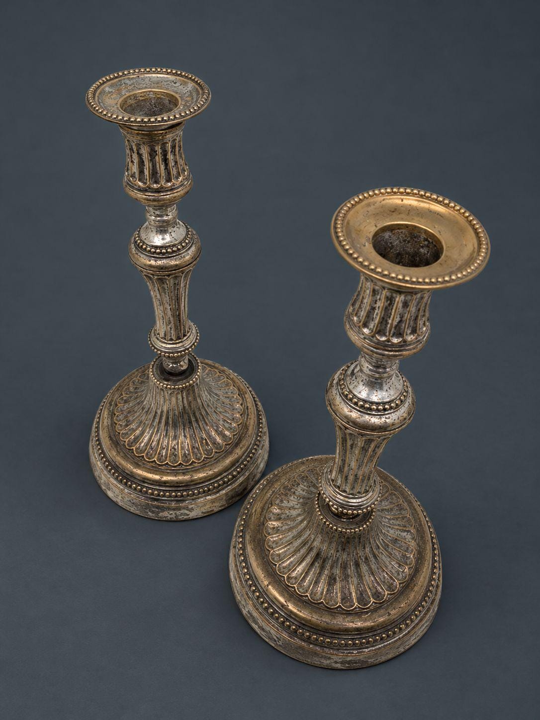 Pair of Antique 18th Century Louis XVI Silvered Bronze Candlesticks, Fluted Baluster Stems and Beaded Bands, Round Bases