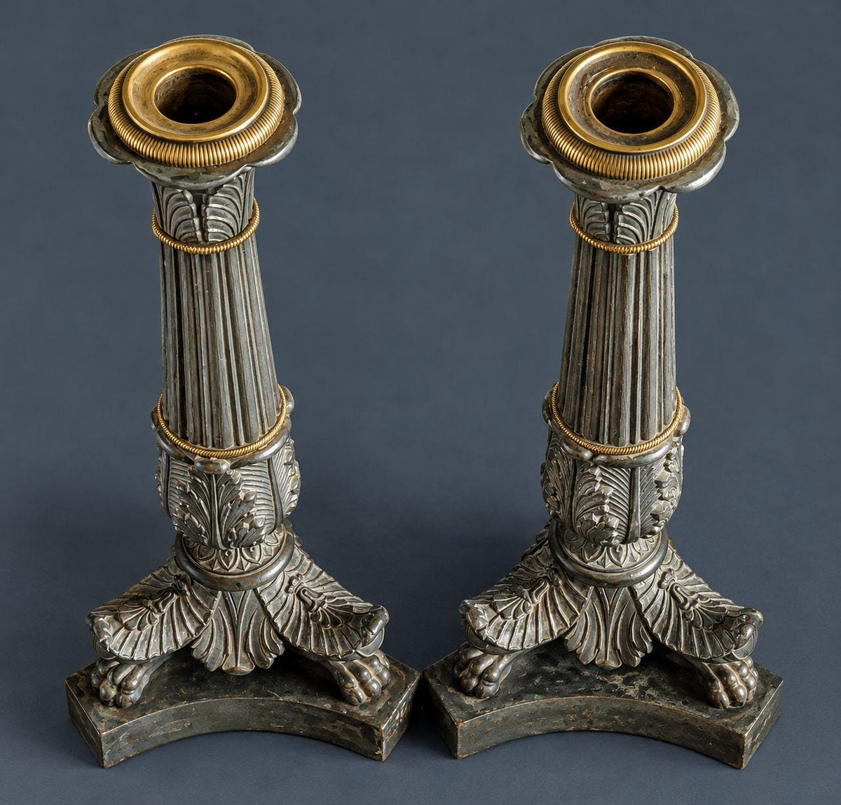 Pair of Antique Restauration Period Patinated Bronze Candlesticks, Fluted Columns with Palmettes and Lion Paw Feet, 1815-1830