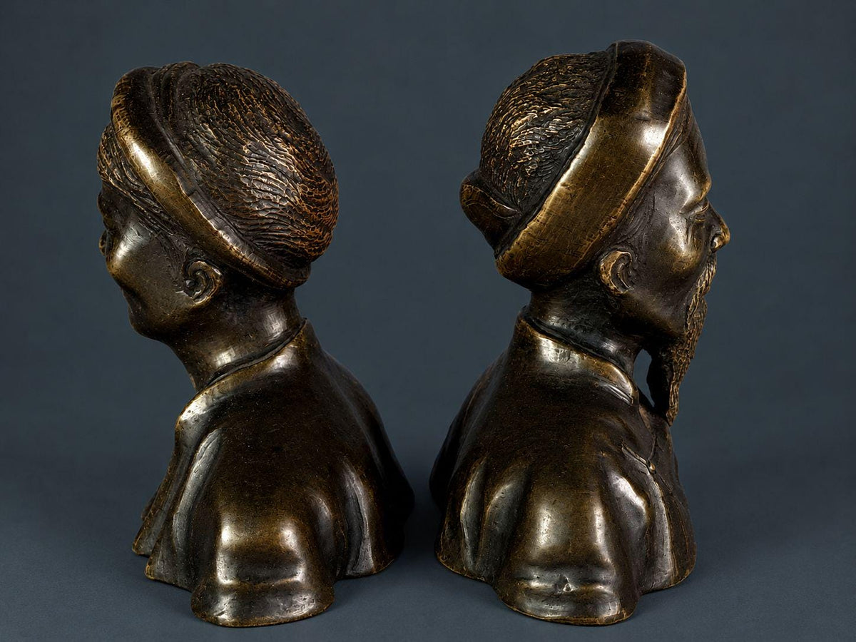 Pair of Antique Patinated Bronze Busts, Elderly Vietnamese Man and Woman in Traditional Khan Turbans, circa 1900