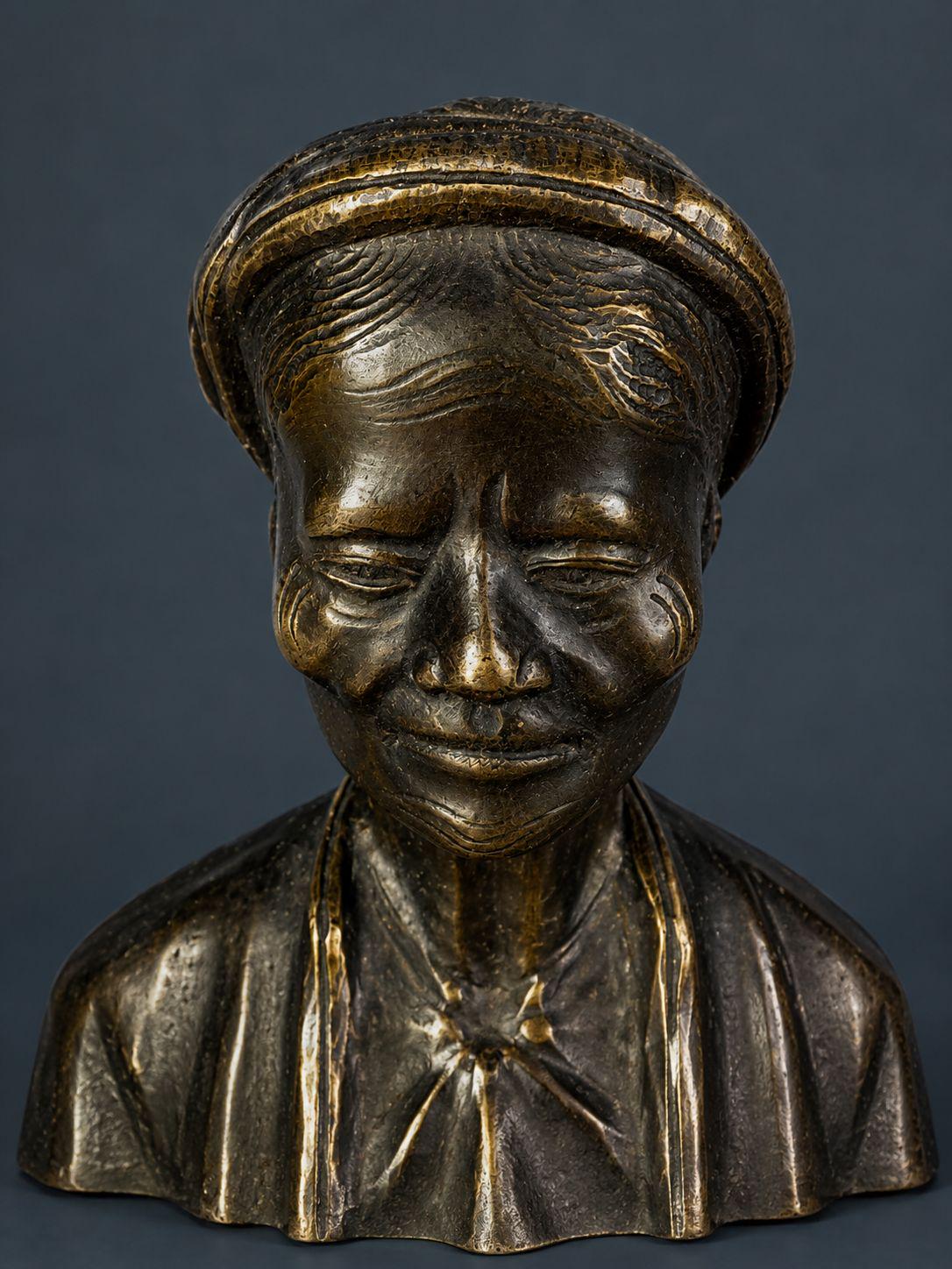 Pair of Antique Patinated Bronze Busts, Elderly Vietnamese Man and Woman in Traditional Khan Turbans, circa 1900