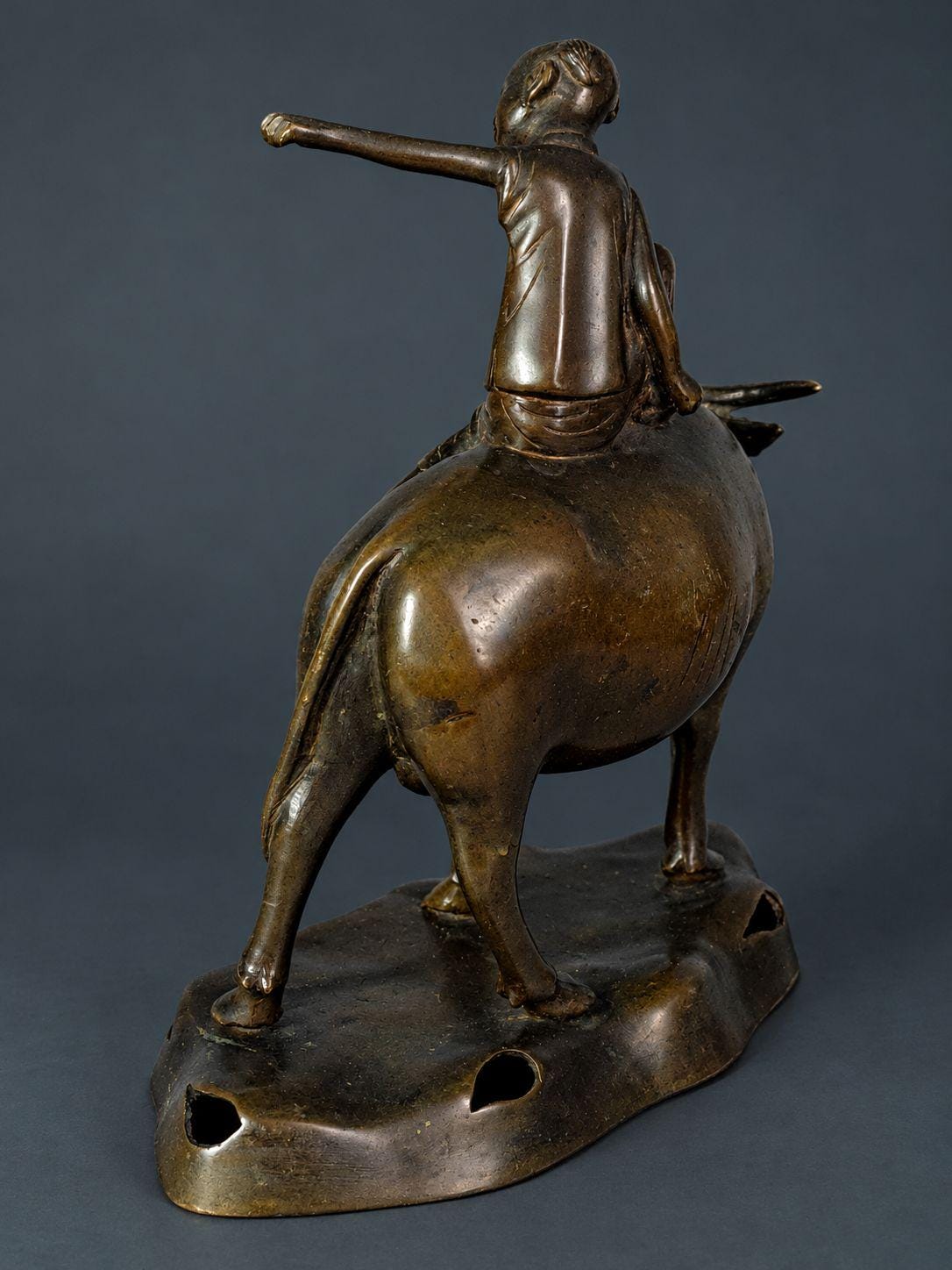 Antique Patinated Bronze Boy Riding a Water Buffalo, Herd Boy Sculpture on Pierced Rockwork Base, Asian Decor, circa 1900