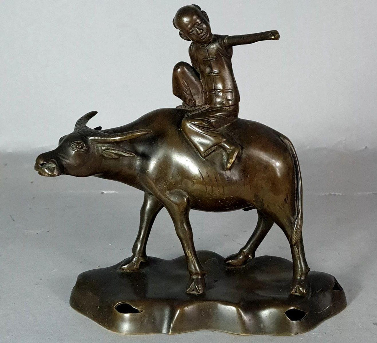 Antique Patinated Bronze Boy Riding a Water Buffalo, Herd Boy Sculpture on Pierced Rockwork Base, Asian Decor, circa 1900