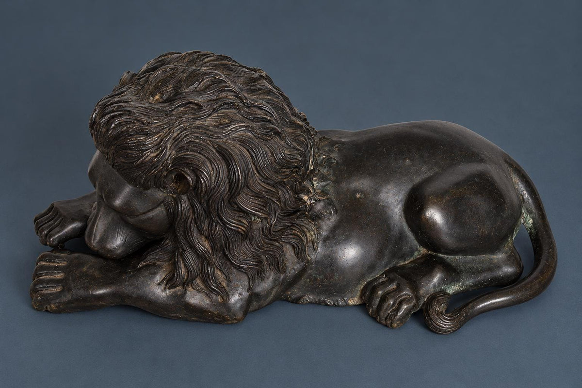 Antique Grand Tour Bronze Recumbent Lion After Canova, Resting Lion with Crossed Paws and Flowing Mane, Dark Patina, 11.5 in