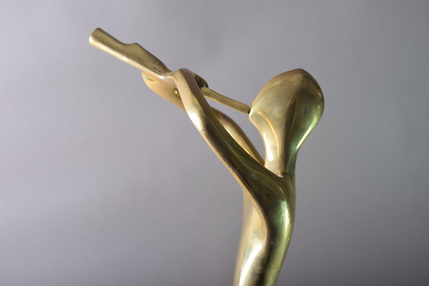 Brass Sculpture of Musician on travertine base, 1980s