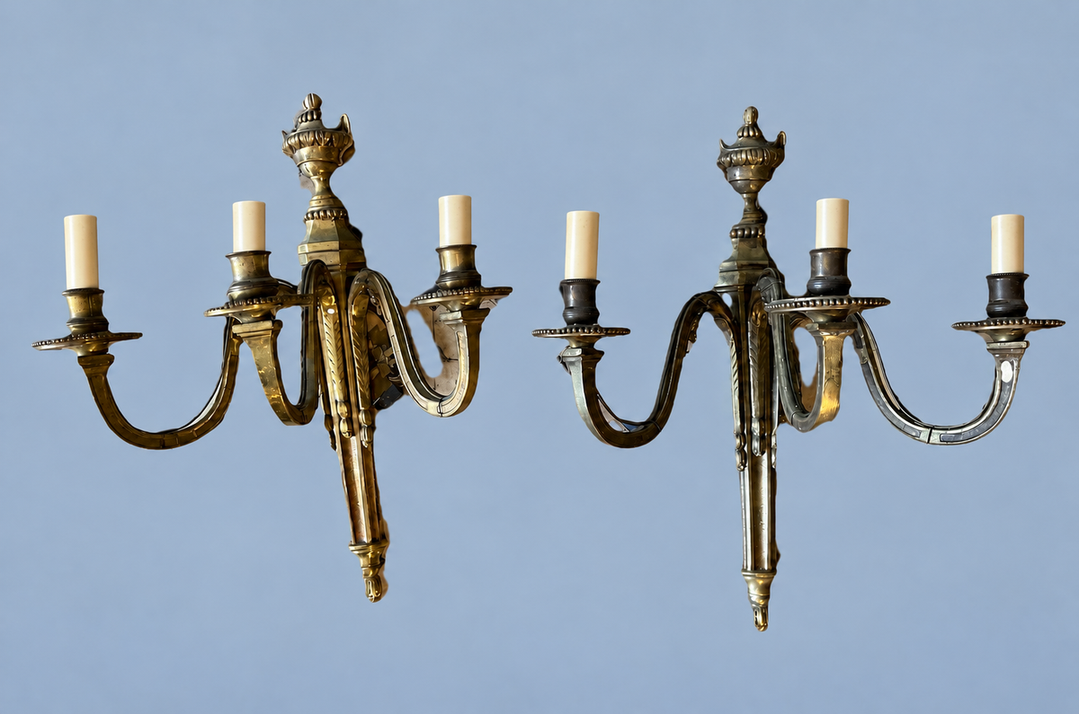 Vintage Pair of Louis XVI Style Three-Arm Bronze-Tone Wall Sconces with Urn Finials