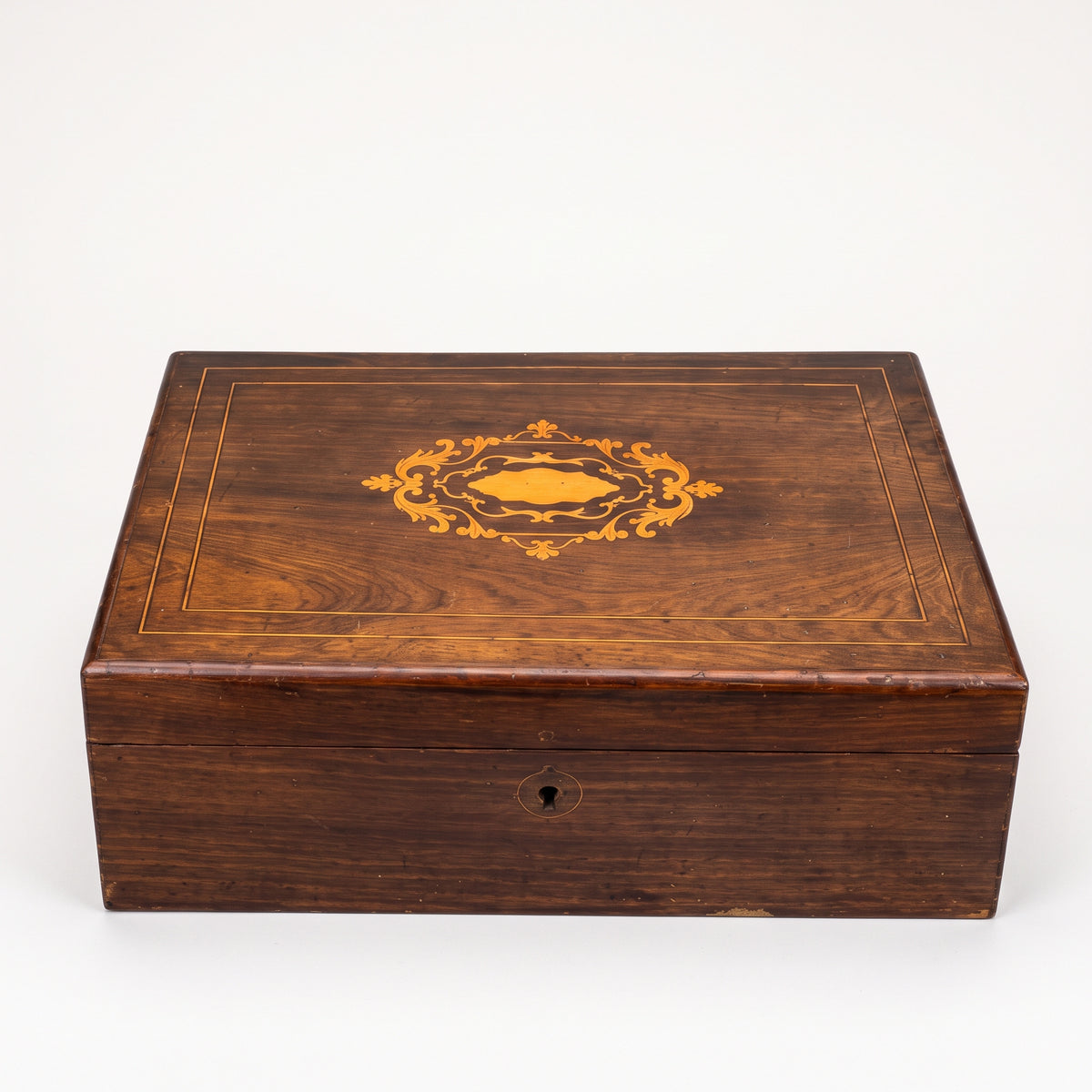 LM-V-499 — Original closed marquetry box, warm symmetrical white studio photograph