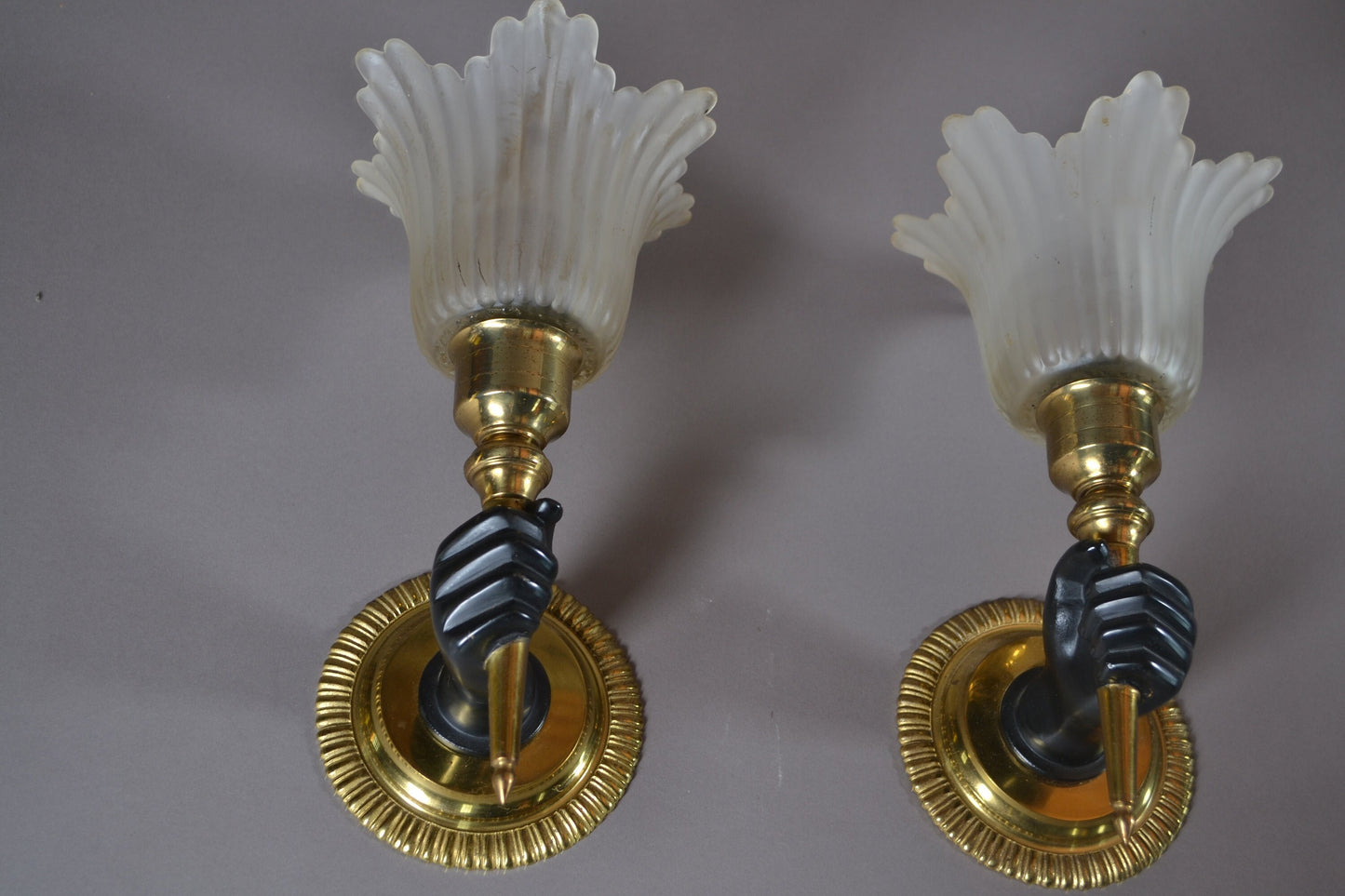 Fist holding torch wall scone Pair 1930s