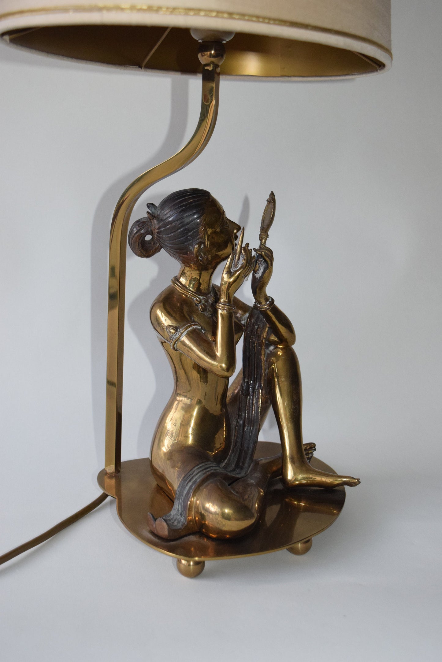 Vintage Brass sculpture lamp of a woman sitting