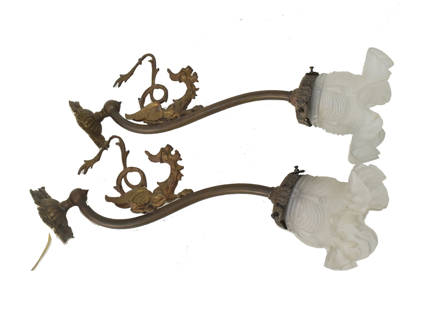 A Pair of Antique bronze wall lights