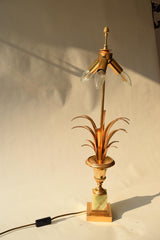 Vintage 1970s S.A. Boulanger Palm Pineapple Lamp featuring a gilded gold metal palm tree design mounted on a solid onyx base. This Belgian-made lamp exemplifies Hollywood Regency style, adding a touch of luxury and elegance to any interior space. With a height of 74 centimeters and a width of 24 centimeters, it's an ideal decorative piece for living rooms, bedrooms, or offices seeking vintage charm.