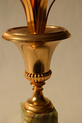 Vintage 1970s S.A. Boulanger Palm Pineapple Lamp featuring a gilded gold metal palm tree design mounted on a solid onyx base. This Belgian-made lamp exemplifies Hollywood Regency style, adding a touch of luxury and elegance to any interior space. With a height of 74 centimeters and a width of 24 centimeters, it's an ideal decorative piece for living rooms, bedrooms, or offices seeking vintage charm.